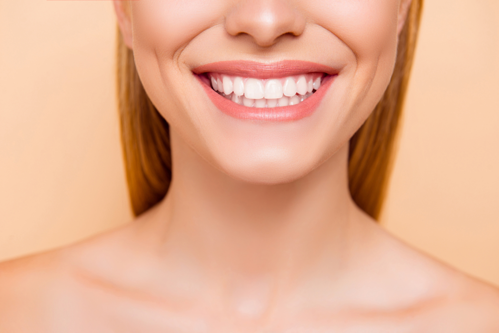 woman smiling with teeth